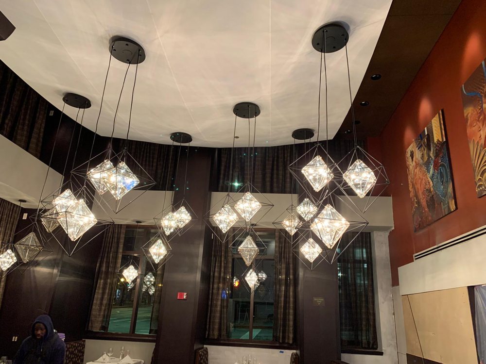 Crystal pendant lights installed in restaurant